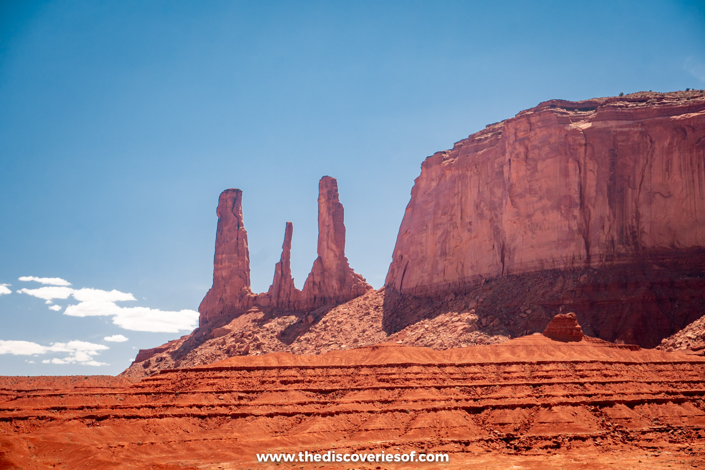 The slender spires of the Three Sisters in Monument Valley