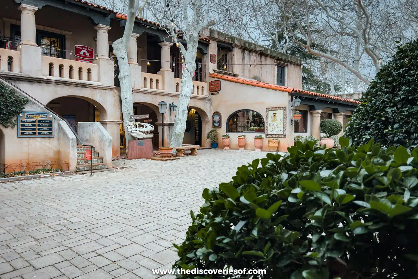 Whitewashed arches and a tiled courtyard at Tlaquepaque Arts and Shopping Village, Sedona