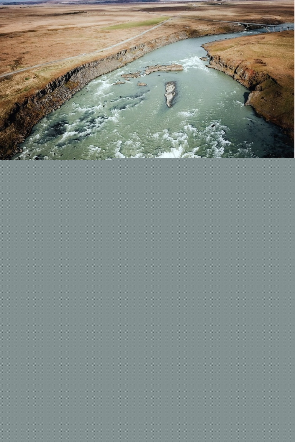 Urriðafoss pin: aerial views of the wide glacial river Þjórsá tumbling over Urriðafoss
